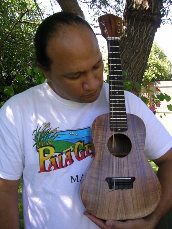 Oral Abihai and one of his ‘ukulele instruments. Courtesy photo. 